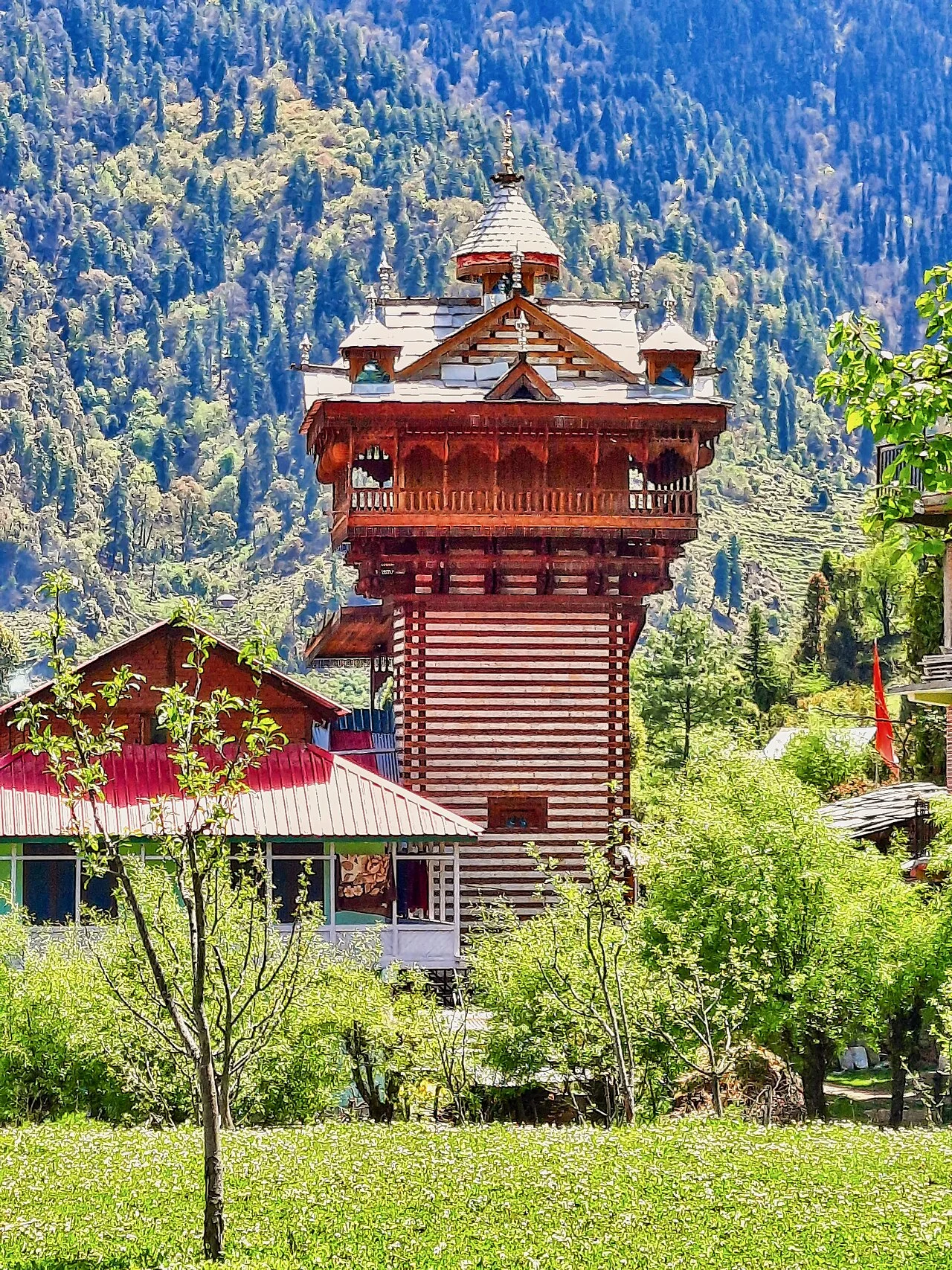 Multi-tiered pagoda temple of Shangchul Mahadev on the sacred meadow